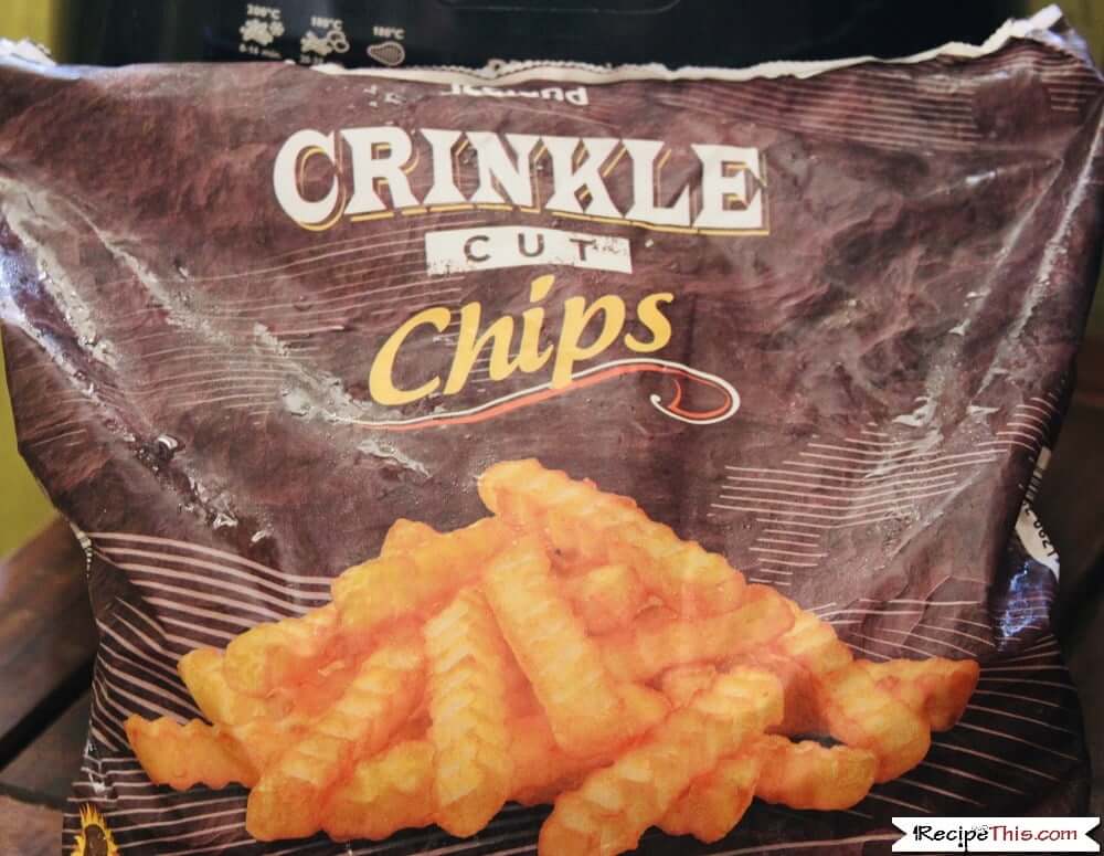 https://recipethis.com/wp-content/uploads/Air-Fryer-Frozen-Crinkle-Cut-Fries-in-the-bag.jpeg