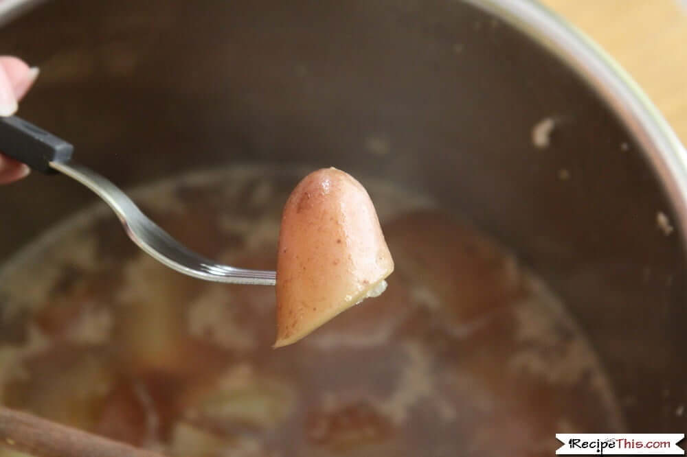 Instant Pot Frozen Chicken And Potatoes on the fork