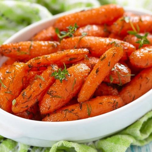 Welcome to my Paleo inspired honey glazed carrots in the slow cooker recipe.