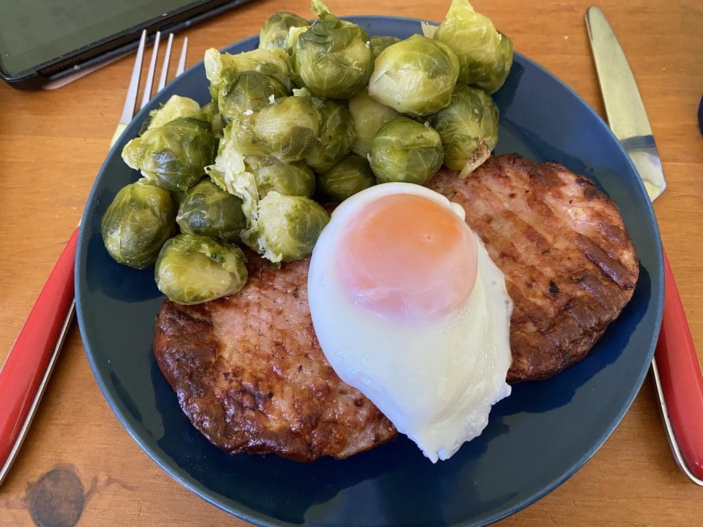 air fryer chicken burgers with poached eggs and sprouts
