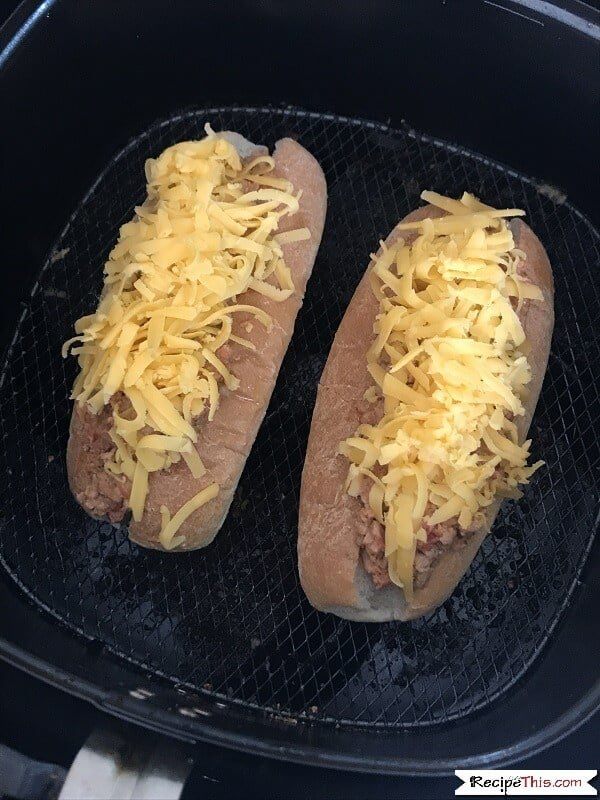 air fryer chili cheese dogs with plenty of cheese
