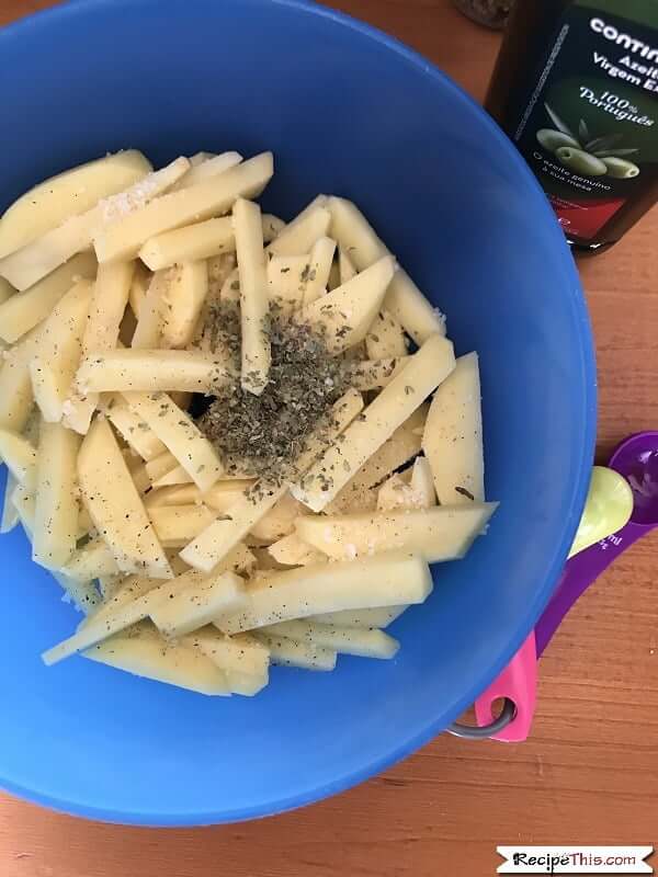 air fryer fries - adding seasoning and oil
