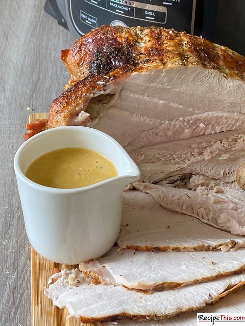 https://recipethis.com/wp-content/uploads/ninja-foodi-turkey-breast.jpg